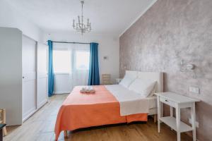 Postel nebo postele na pokoji v ubytování Franciacorta Rooms
