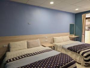 Letto o letti in una camera di 知本溫泉の旅宿