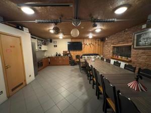 a conference room with a long table and chairs at Aare Accommodation in Valga
