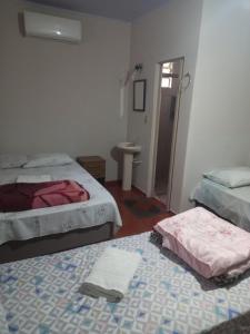 Postel nebo postele na pokoji v ubytování Pousada dos Viajantes