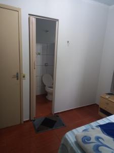 Postel nebo postele na pokoji v ubytování Pousada dos Viajantes