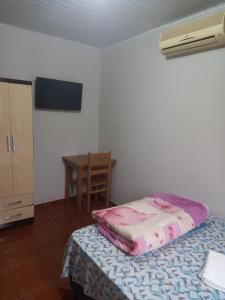 Postel nebo postele na pokoji v ubytování Pousada dos Viajantes