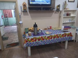 TV a/nebo společenská místnost v ubytování Pousada dos Viajantes