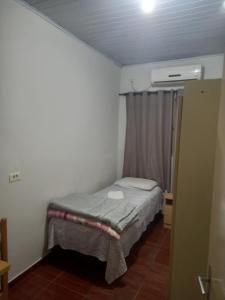 Postel nebo postele na pokoji v ubytování Pousada dos Viajantes