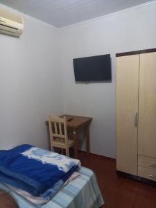 Postel nebo postele na pokoji v ubytování Pousada dos Viajantes