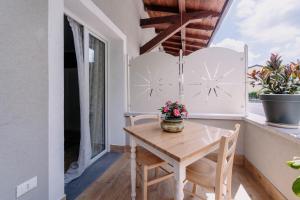 Balkón nebo terasa v ubytování Franciacorta Rooms