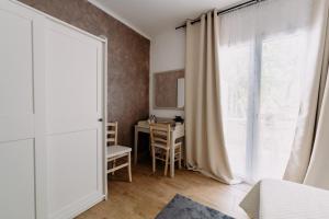 Fotografie z fotogalerie ubytování Franciacorta Rooms v destinaci Corte Franca