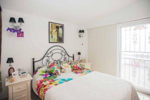 A bed or beds in a room at Villa Allegra