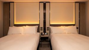 Cama ou camas em um quarto em InterContinental Wellington by IHG