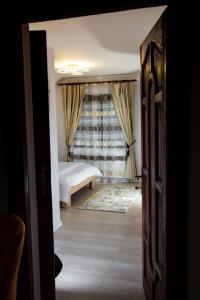 Ένα ή περισσότερα κρεβάτια σε δωμάτιο στο Casa Agnes