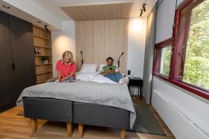 Ein Bett oder Betten in einem Zimmer der Unterkunft Hotel Linnasmäki