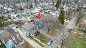 an overhead view of a house with a red sign at The Huron Charmer-4 BD and Yard in Columbus