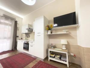 A kitchen or kitchenette at CATHEDRAL APARTMENT