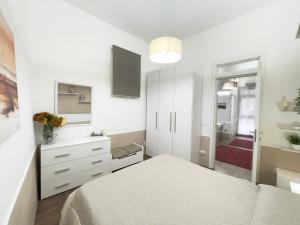 A bed or beds in a room at CATHEDRAL APARTMENT