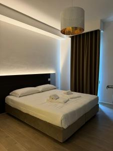 Postel nebo postele na pokoji v ubytování Hotel Airone