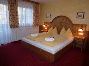 Posteľ alebo postele v izbe v ubytovaní Hotel Garni Landhaus Trenkenbach