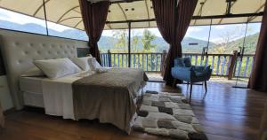 Cama ou camas em um quarto em Pousada Terraço Penedo