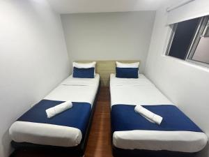 Hotel Embajada Bogota DC客房内的一张或多张床位