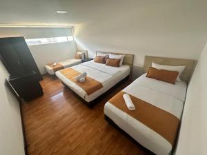 Hotel Embajada Bogota DC客房内的一张或多张床位