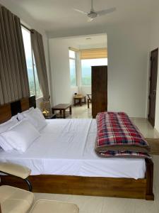 Letto o letti in una camera di Galkaduwa360 Villa