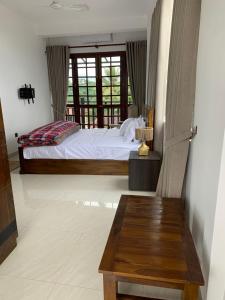 Letto o letti in una camera di Galkaduwa360 Villa