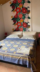 Postel nebo postele na pokoji v ubytování Versilia Garden Rooms