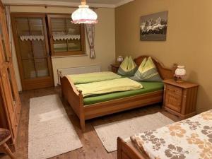A bed or beds in a room at Stegerbauer