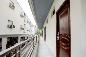 Balkón nebo terasa v ubytování Hotel O Tilak hotel 24 Sector 27 Near by Vinayak Hospital Gali no-6