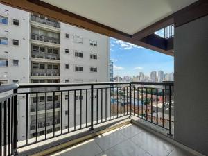 a balcony with a view of a city at Nex One Sena Madureira in Sao Paulo