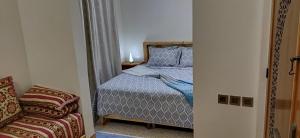 Postel nebo postele na pokoji v ubytování Charme de Safi entre Océan et Héritage
