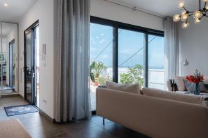 Posezení v ubytování GuestReady - Anakaj House + 37 fotografií