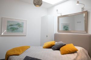 Postel nebo postele na pokoji v ubytování GuestReady - Anakaj House