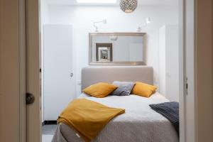 Postel nebo postele na pokoji v ubytování GuestReady - Anakaj House