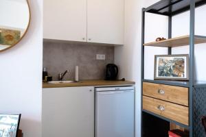 Kuchyň nebo kuchyňský kout v ubytování GuestReady - Anakaj House