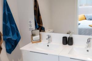 Postel nebo postele na pokoji v ubytování GuestReady - Anakaj House