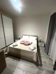A bed or beds in a room at Villa Rita