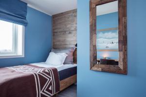 Postel nebo postele na pokoji v ubytování 8 Seasons Hotel