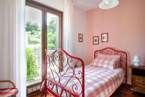 Ένα ή περισσότερα κρεβάτια σε δωμάτιο στο Casa in Gallura - Mare, Montagna, Escursioni