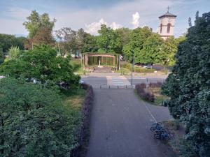 a view of a park with a pavilion and a tower at 3 Zimmer Apartment in Saint Louis, Nahe Euroairport in Saint-Louis