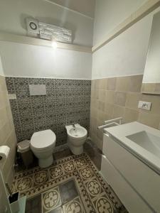 Koupelna v ubytování Immacolata Rooms
