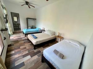 Postel nebo postele na pokoji v ubytování Cancun-Soho