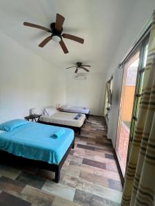 Postel nebo postele na pokoji v ubytování Cancun-Soho