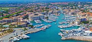 an aerial view of a marina with boats in the water at le capitole in Fréjus