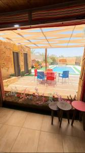 Balkón nebo terasa v ubytování شاليه الريف - البحر الميت - النهضة Chalet Al-Reef - DeadSea - Al-Nahda