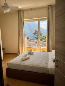 Postel nebo postele na pokoji v ubytování Hotel Locanda Castagnola