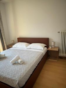 Postel nebo postele na pokoji v ubytování Hotel Locanda Castagnola