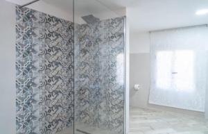 Ванная комната в Villa con piscina al mare