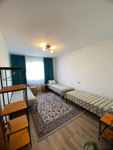 Giường trong phòng chung tại Agyn guest house