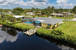 an aerial view of a house on a river at Welcome To Sanctuary & Flair - Casa de Photograph in North Fort Myers