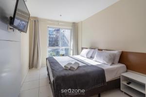 Giường trong phòng chung tại Apto entre a Praia do Braga e do Forte - FMI0218 +18 ảnh
